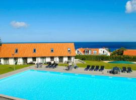 5 person holiday home on a holiday park in Gudhjem, hotel en Gudhjem