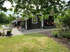 At Lovely Lyngsbæk Strand Near Ebeltoft, This Lovely Holiday Home Is At The End Of A Blind Path On A Beautiful, Large, Enclosed Plot, It Only Takes Approx, 5-6 Min, To Walk From The House Down To The Beach