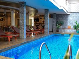 Triton Beach Hotel & Spa, viešbutis Mafušyje