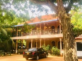 New Land Guest House, hotel en Pasikuda