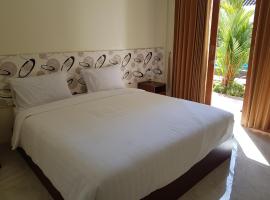 Praba Guesthouse, hotel in Kuta