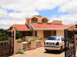 Rainbow Cottages, hotel em Ooty