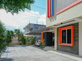 RedDoorz near Millenium Waterpark Palu, hotel v destinaci Palu