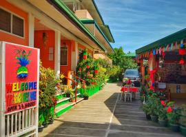 WHITE BEACH GUEST HOUSE, hótel í Puerto Galera