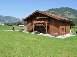 Alpenchalet Weidhaus Gstaad, хотел в Гстаад