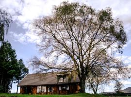 The Log Cabin at Elgin, מלון באונדרברג