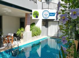 The Umbrella House - SHA Extra Plus, hôtel à Kamala Beach