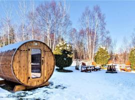 Spa, sauna et foyer : Le Phare de Baie-Saint-Paul, hotel in Baie-Saint-Paul