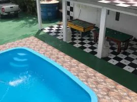 Ótima casa com piscina em Praia Grande