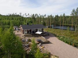 Luxury Villa Rahavaara, casa rústica em Joensuu