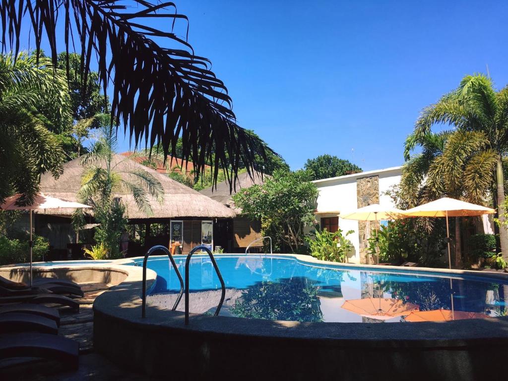 The swimming pool at or close to Acacia Tree Garden Hotel