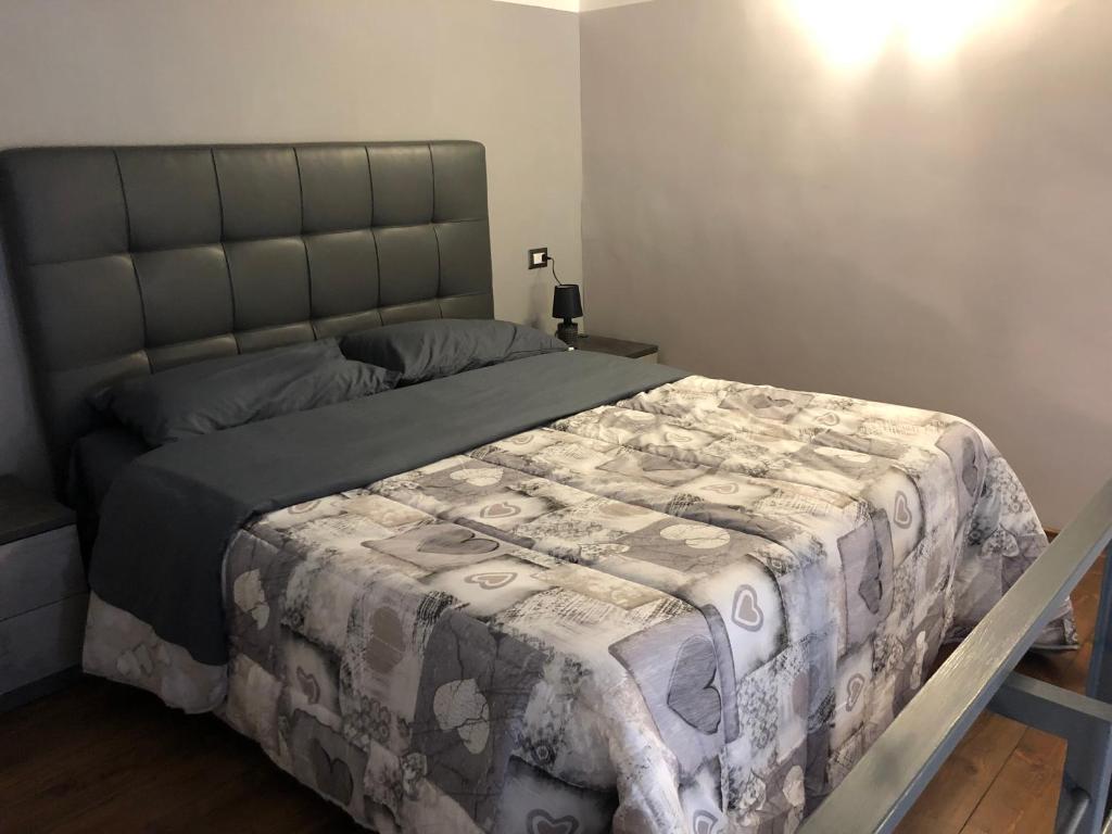 Postel nebo postele na pokoji v ubytování FORIA 58 APARTAMENTS