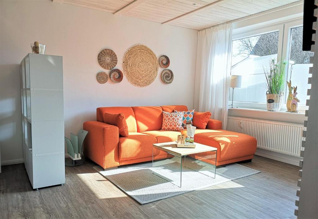 A seating area at Butze Ferienapartment