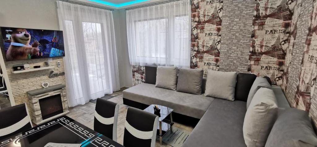 TV i/ili zabavni centar u objektu Sweet&Center Wellness apartman