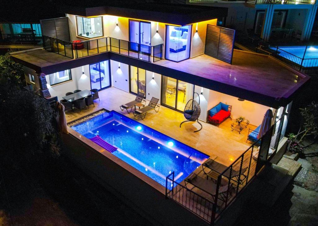 an aerial view of a house with a swimming pool at Kalkan Halal villa in Kas