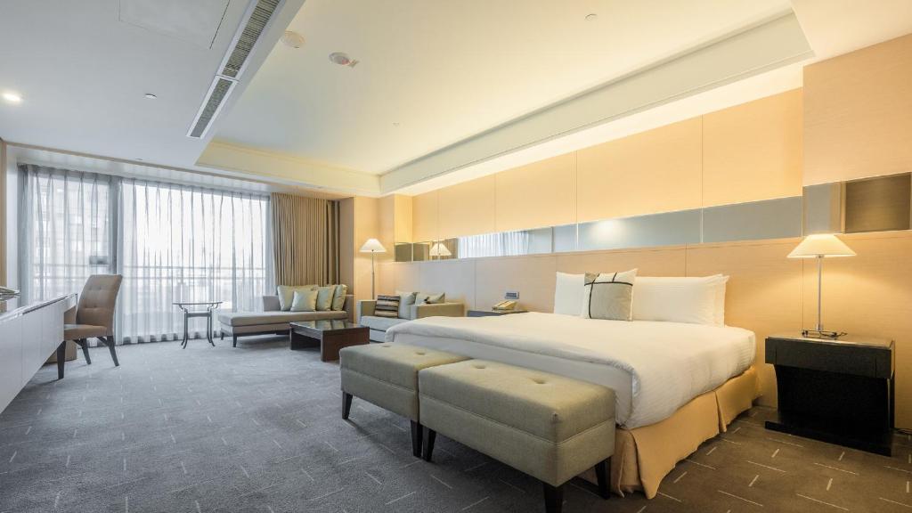 Tempat tidur dalam kamar di CHECK inn SELECT Taichung Dadun