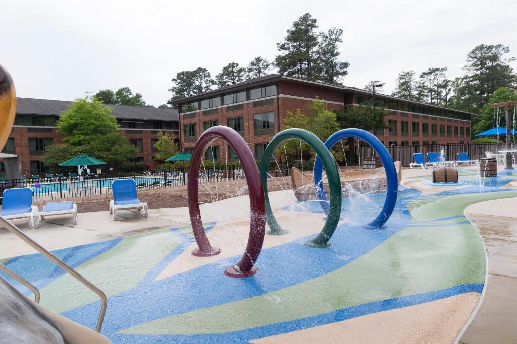 a water park with a water slide at Williamsburg Woodlands Hotel & Suites, an official Colonial Williamsburg Hotel in Williamsburg