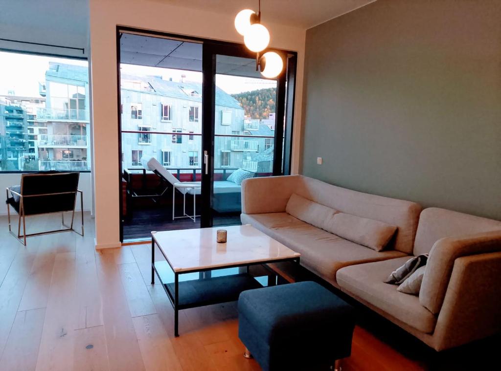 Ruang duduk di BEACHFRONT LUXURY APARTMENT BY CENTRAL STATION Oslo