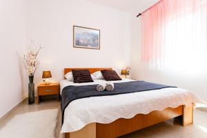 Lova arba lovos apgyvendinimo įstaigoje Guest House Mara