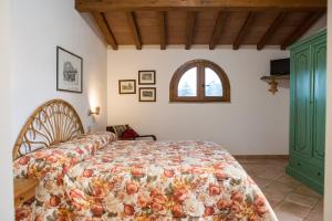 Una cama o camas en una habitación de Agriturismo Casa Andreina