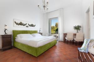 Voodi või voodid majutusasutuse Villa Oriana Relais toas