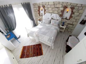 Cama ou camas em um quarto em Morisi Konak Butik Otel