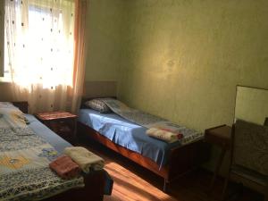 A bed or beds in a room at Guest House GarniResthost