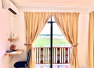 A balcony or terrace at Am Transit Inn, Kuala Terengganu