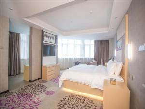 Ein Bett oder Betten in einem Zimmer der Unterkunft Lavande Hotels·Foshan Nanhai Dali New Metropolis