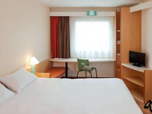 Ліжко або ліжка в номері ibis Fribourg