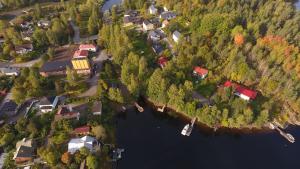 an aerial view of a village on the water at huoneisto 2 in Savonlinna