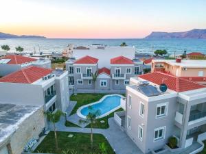 una imagen de una villa con vistas al océano en Limosa Luxury Residences, en Kissamos