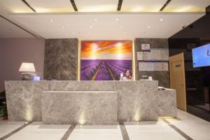 Lavande Hotel Xuzhou West Exit of High Speed Rail Station Branch tesisinde bir televizyon ve/veya eğlence merkezi