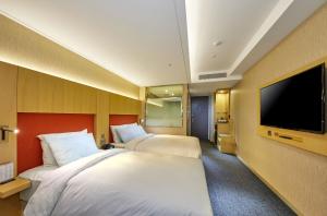 Televisor o centre d'entreteniment de Hotel Midcity Myeongdong