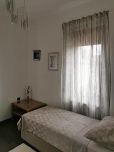 Vuode tai vuoteita majoituspaikassa Apartmani Nika