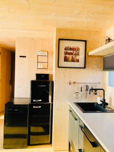 A kitchen or kitchenette at Ecobeachvilla Buqez 9