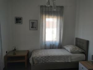 Vuode tai vuoteita majoituspaikassa Apartmani Nika