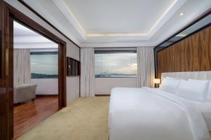 Katil atau katil-katil dalam bilik di Swiss-Belhotel Harbour Bay