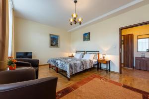 Un pat sau paturi într-o cameră la Villa Walir - Spa Hotel Garni SUPERIOR