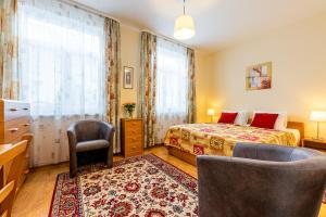 Un pat sau paturi într-o cameră la Villa Walir - Spa Hotel Garni SUPERIOR