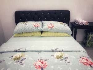 Giường trong phòng chung tại Arsyad Homestay Changlun