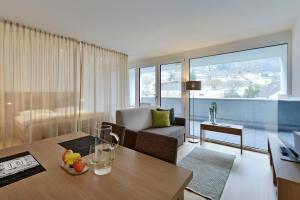 Uma área de estar em Relaxed Urban Living - Aparthotel und Boardinghouse