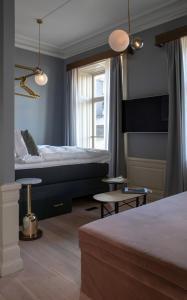 Een bed of bedden in een kamer bij Hotel Frantz, WorldHotels Crafted