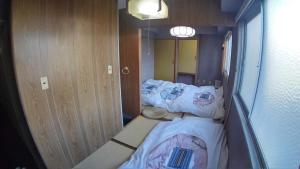 Katil atau katil-katil dalam bilik di Setouchi Triennale Hotel 403 Japanese style Art Female only - Vacation STAY 62544