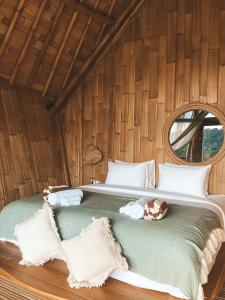 Kalma Bamboo Eco Lodge 객실 침대