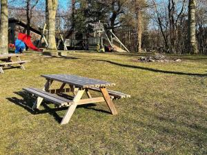 Children's play area sa 4 person holiday home in Allinge