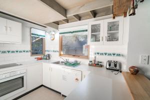 A kitchen or kitchenette at Crep de Mont