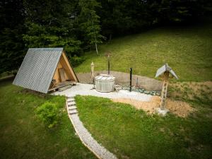 A garden outside PUŽMAN Farm Glamping