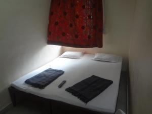 Cama o camas de una habitación en Hotel Rajmandir