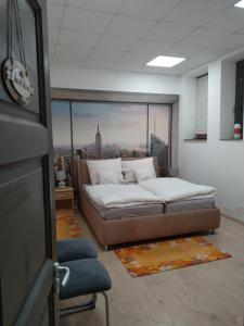 Postel nebo postele na pokoji v ubytování Silver Dream Apartmanház